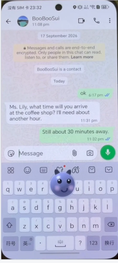 WhatsApp 聊天页：回复「Still about 30 minutes away.」已发出并打上已读双勾，Andee 的悬浮球坐在下方键盘上。